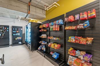 A vending machine with a variety of snacks inside.